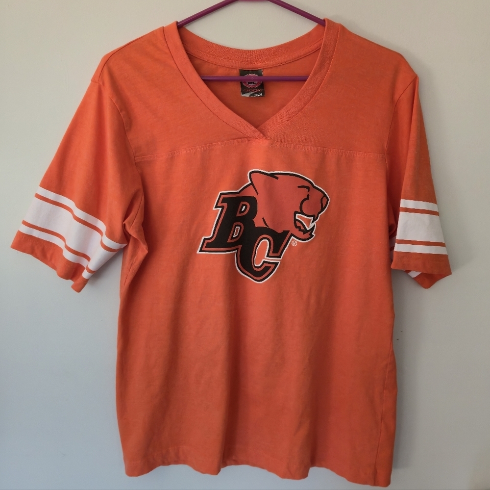 Soga Sports CFL BC Lions Orange Football Jersey V-Neck Tee XL Streetwear Sporty